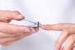 © Jezabel - close up of nail inside a nail clipper, manicure at home, body care.