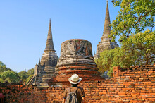 Visitor Being Impressed By Incredible Pagoda Ruins Of Wat Phra Si Sanphet From The Outside Of Archaeological Complex, Ayutthaya Historical Park, Thailand