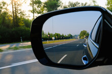 Look In The Rear View Mirror Of A Car