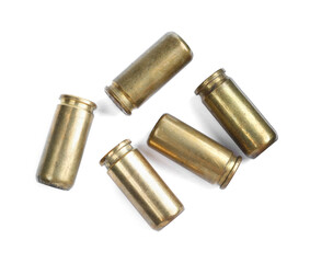 Wall Mural - Cartridge cases isolated on white, top view. Firearm ammunition