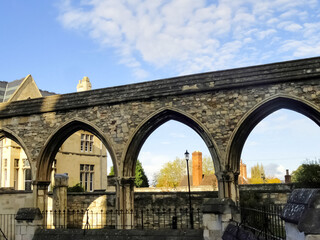 Wall Mural - Old houses and arched construction in the old part In Gloucester