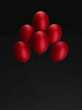 Czerwone balony na czarnym tle