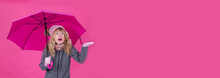 Middle Aged Woman With Umbrella On Pink Background