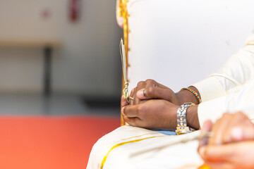 Indian wedding ceremony people's hands close up