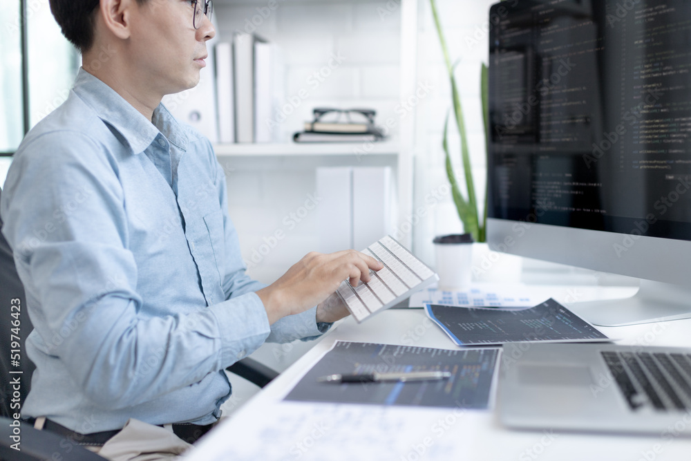 Professional development programmers are sit on a desk with work ...