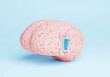 Switching the brain off or on with a switch. Brain and switch on a blue background. 3d render