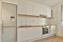 Modern Kitchen With White Cabinets