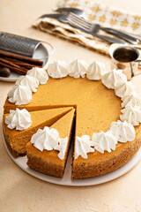 Wall Mural - Pumpkin cheesecake with fall spices topped with whipped cream