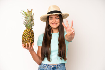 Wall Mural - hispanic pretty woma screaming with hands up in the air. pineapple and summer concept