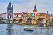 The Tourist Boat On Vltava River At The Charles Bridge, Prague, Czech Republic