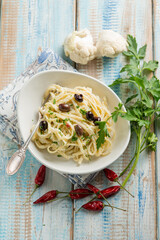 Canvas Print - Pasta with cauliflower black olives and hot chili pepper