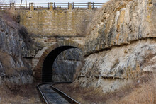 Road Bridge With A Railway Tunnel In The Canyon. Inscription In Russian 1893. Background With Copy Space