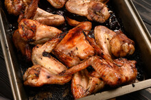 Appetizing Chicken Wings Grilled Barbecue With Spices And Vegetables Until Crisp