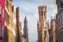 Belfry Tower And Flemish Architecture In Bruges At Sunny Day, Belgium