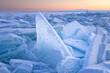 © Cavan Images - snowed blocks of clear ice ar sunrise