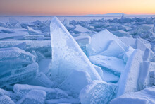 Snowed Blocks Of Clear Ice Ar Sunrise