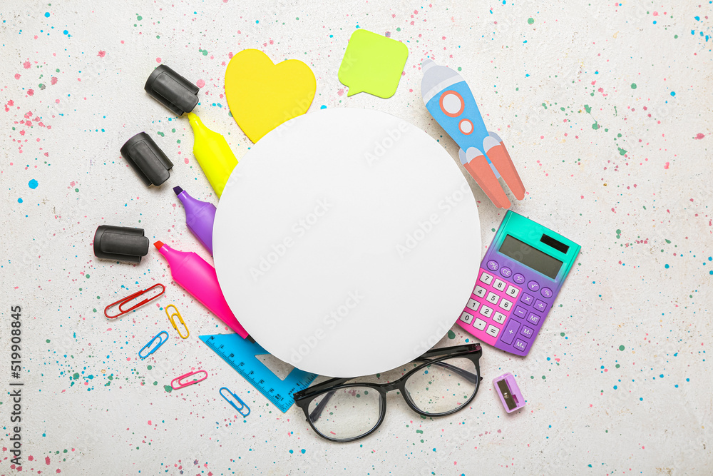 Blank paper sheet with rocket, school stationery and eyeglasses on light background