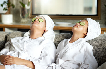 Sticker - Beauty, relaxing and skincare for mother and daughter, having a spa treatment at home. Little girl and parent bonding while doing hygiene, refreshing grooming. Females with cucumber, facial mask