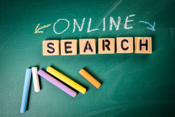 Canvas Print - Online Search concept. Text on blackboard background