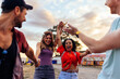 © bernardbodo - Group of friends enjoying on festival event