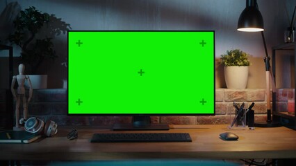 Fototapete - Zoom Out Shot of a Modern Personal Computer Monitor with Chroma key Green Screen Display Standing on the Desk of a Cozy Home Office. Living Room Created by Interior Designer with Good Taste and Style.