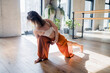 © muse studio - Yoga training in a fitness club, asana exercises for balance and harmony of the body