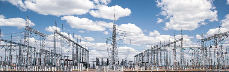 large electrical substation in the desert against the blue sky