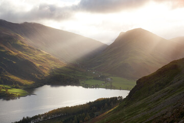 Sticker - Looking across to Fleetwith Pike and Dale Head at sunrise from above Buttermere and below Red Pike in the Autumn in the Lake District, UK.