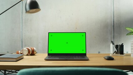 Fototapete - Laptop Computer with Mock Up Green Screen Display Standing on a Desk. Efficiently Minimalistic Design of Modern Office Space That Guarantees Harmony and Productivity. Chroma Key Monitor. Zoom In