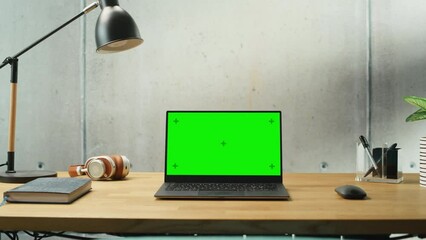 Fototapete - Laptop Computer with Mock Up Green Screen Display Standing on a Desk. Efficiently Minimalistic Design of Modern Office Space That Guarantees Harmony and Productivity. Mock-up Chroma Key Monitor