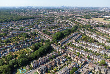 Aerial View Highams Park, A Residential Neighbourhood Surrounded By Forest And Green Parks On The Outskirts Of London. Upmarket Residential Housings, And Semi Detached Houses In The Morning Summer Sun
