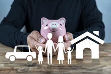 Man With Piggy Bank, Home And Car. Concept Of Saving Money For House And Car. Saving Money Concept
