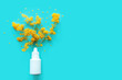 allergy concept. antihistamine nasal spray against allergies on a blue background with space for text