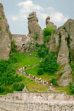 This Place Called  Belogradchic Rocks Is In Bulgaria. Centuries Old Rock Look Like Figures Or Appear Like Characters . Climb The Stairs To The Top Or Look At The Gatehouse Of The Old Fortress.