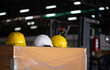 Group of safety helmet on box in factory warehouse storage, Hard safety wear helmet hat on wooden box