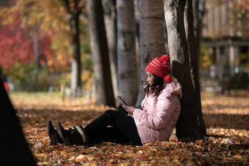 Wall Mural - Young healthy Asian woman travel in autumn season, Japan.