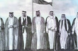 The seven founding fathers of UAE United Arab Emirates with flag after signing the union document from the obverse side of the new polymer commemorative 50 fifty Dirhams with Memorial to the martyrs