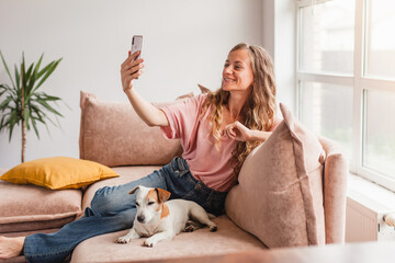 Poster - Happy casual beautiful woman is talking on a mobile phone