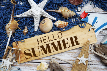Wall Mural - hello summer text message decoration with seashell and marine on wooden background