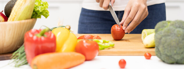 Wall Mural - Healthy lifestyle with good natural food. Person showing fresh variety vegetables ingredients for healthy meal.