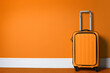 © New Africa - Bright suitcase near orange wall. Space for text