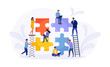 Tiny people connecting puzzle pieces trying to find a solution together. Effective workflow. Teamwork, cooperation, partnership and collaboration. Business concept