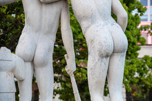 Close View Of The Butts Of Two Ancient Roman Young Male Sculptures, Naples