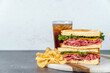 © Stacy Howell - Deli sandwich with drink on a light surface