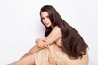 © millaf (Nemchinova) - Beautiful woman brunette with long healthy hairstyle on white background