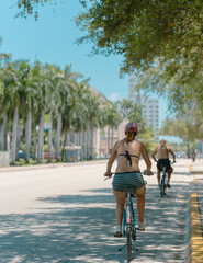 Wall Mural - couple on the beach bike sport lifestyle outdoor miami 