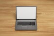 © Igor - modern technologies. work online. laptop on a light brown wooden background. 3d illustration. 3d render