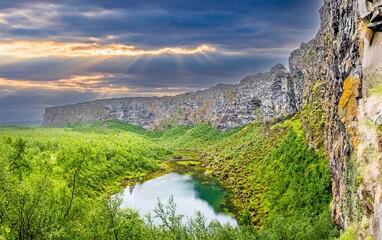 Photo of volcanic gorge Asbyrgi on Iceland during daytime