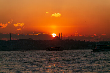Wall Mural - sunset over the blue sea. red sky in Istanbul