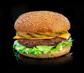 Wall Mural - Fresh tasty burger on black background